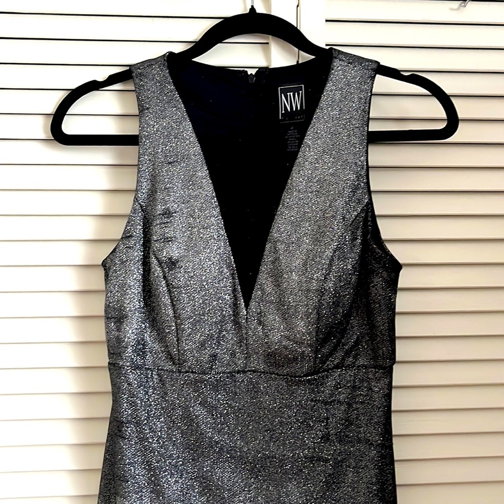 Small metallic black cocktail dress with black mesh detail in middle.
